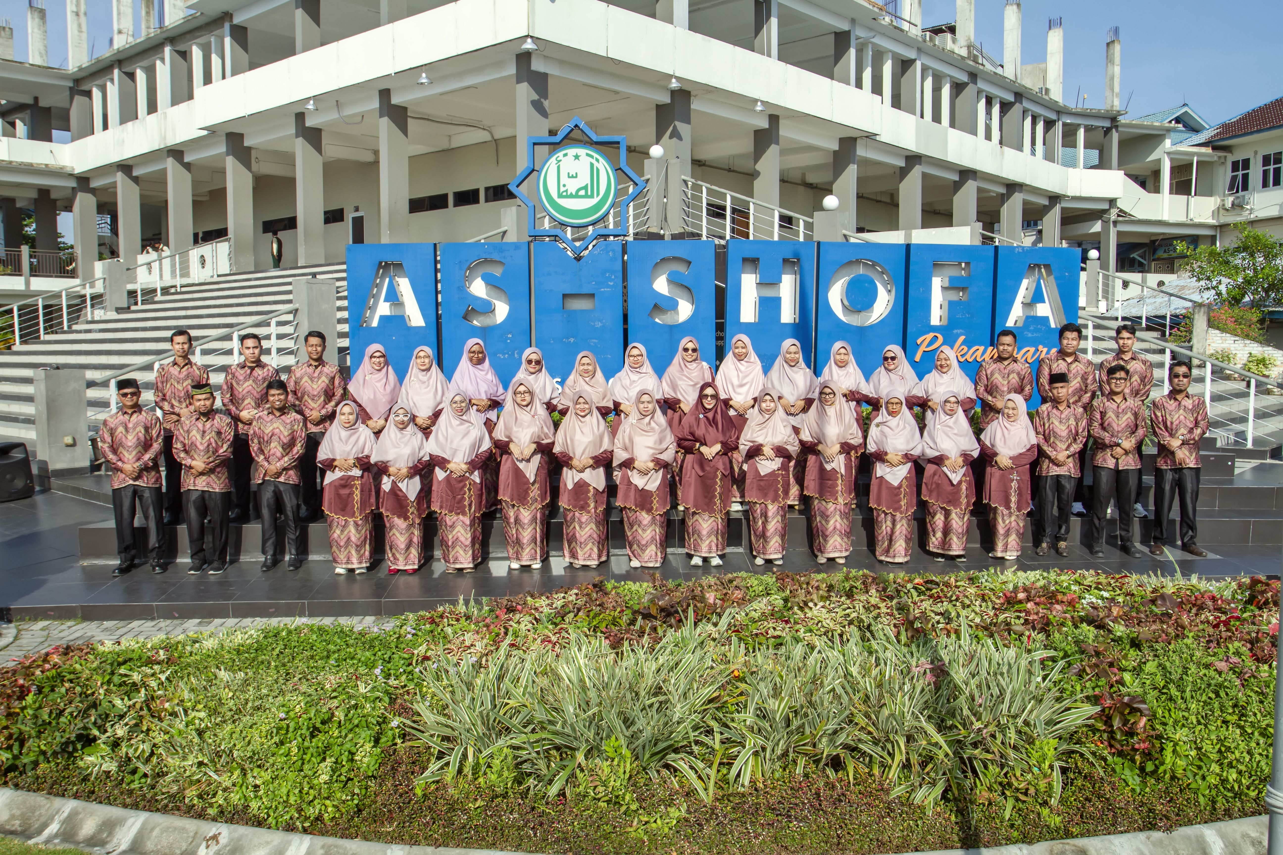 Teachers and Employees of As-Shofa Middle School.